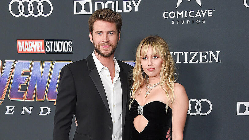 Miley Cyrus und ihr Ex-Mann Liam Hemsworth bei einer Veranstaltung im April 2019. Miley Cyrus und ihr Ex-Mann Liam Hemsworth bei einer Veranstaltung im April 2019.