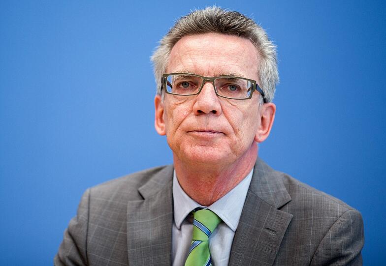Innenminister de Maiziere warnte davor, Flüchtlinge von Anfang an als kriminell einzustufen.