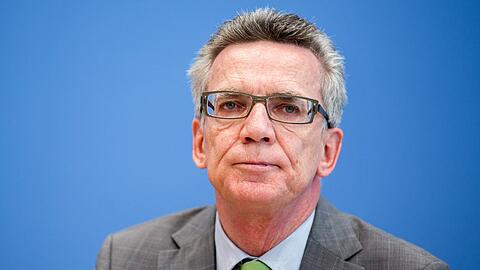 Innenminister de Maiziere warnte davor, Flüchtlinge von Anfang an als kriminell einzustufen.