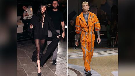 Musiker Machine Gun Kelly lief &uuml;ber den Catwalk bei der Mail&auml;nder Modewoche, Schauspielerin Dakota Johnson schaute zu.