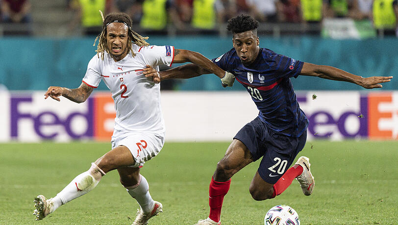 Kingsley Coman (r.) rieb sich auf dem Flügel auf. Er brachte zur Halbzeit neuen Schwung ins französische Spiel. Kingsley Coman (r.) rieb sich auf dem Flügel auf. Er brachte zur Halbzeit neuen Schwung ins französische Spiel.