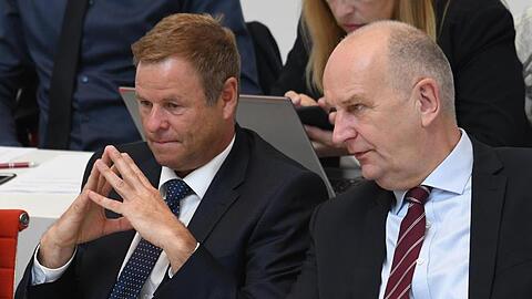 Nach den jüngsten Umfragen ohne rot-rote Mehrheit: Brandenburgs Ministerpräsident Dietmar Woidke (SPD, r.), und Finanzminister Christian Görke (Linke).