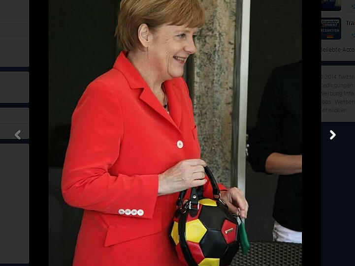 Angela Merkel und ihre Schlandtasche