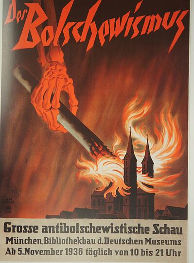 1936: Max Eschle zeichnet das Plakat für die "Große antibolschewistische Schau". Die Nazi-Hetzschau präsentiert im Deutschen Museum das angebliche "Zusammenwirken des Judentums und der Freimaurerei mit dem Bolschewismus".