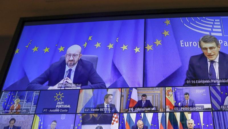 Ein Bildschirm zeigt Charles Michel (l, oben), Präsident des Europäischen Rates, der per Video an einem EU-Sondergipfel teilnimmt.