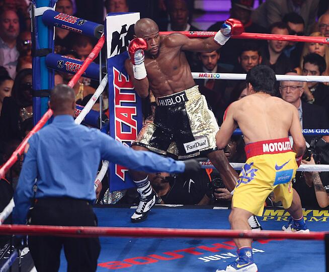 Floyd Mayweather hat den Angriff von Manny Pacquiao im Rekord-Boxkampf erfolgreich abgewehrt und bleibt auch in seinem 48. Profi-Duell ungeschlagen. Der Fight in Bildern.