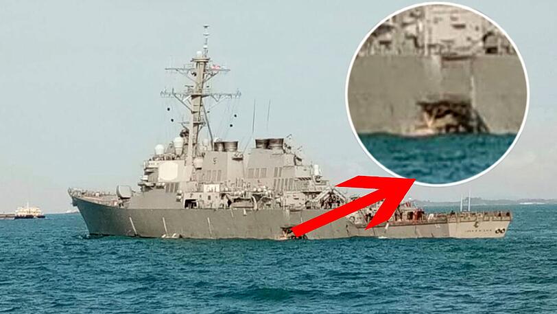 In der Backbordseite des US-Lenkwaffenzerstörer USS John S. McCain klafft nach einer Kollision mit einem Tanker vor der malaysischen Küste ein Loch.