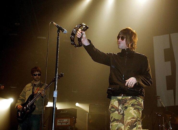 Oasis im Jahr 2003 bei einem Konzert im Münchner Zenith.