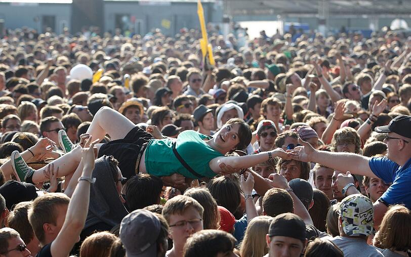 Sonne, Beats und gute Laune: Hunderttausende Musikfans feiern bei den Festivals "Rock im Park" in Nürnberg und "Rock am Ring" auf dem Nürburgring. Die besten Bilder des Wochenendes.