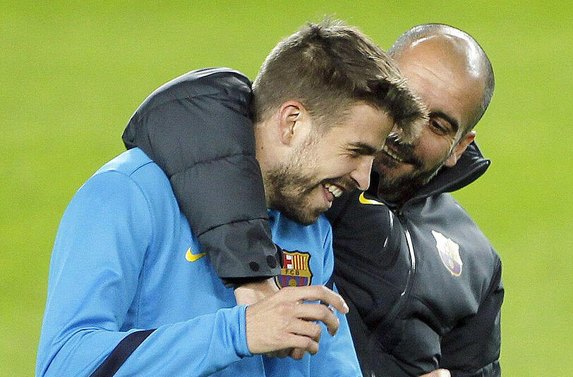 Kennen sich bestens aus ihrer gemeinsamen Zeit beim FC Barcelona: Gerard Piqué und Pep Guardiola.