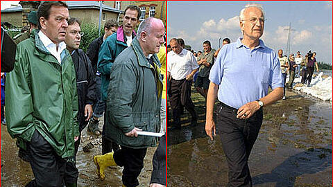 Leadership in Gummistiefeln: Gerhard Schröder (l.) und Edmund Stoiber während der Flutkatastrophe 2002.