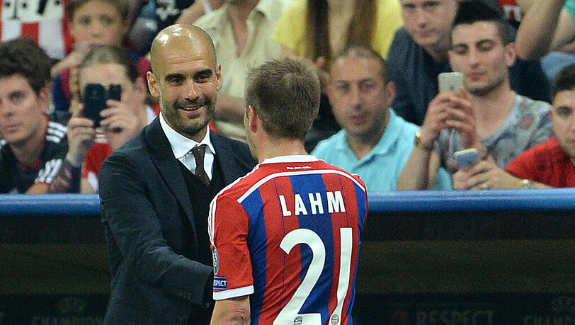 Zwei, die sich (noch länger?) verstehen: Bayern-Trainer Pep Guardiola und Kapitän Philipp Lahm. Zwei, die sich (noch länger?) verstehen: Bayern-Trainer Pep Guardiola und Kapitän Philipp Lahm.