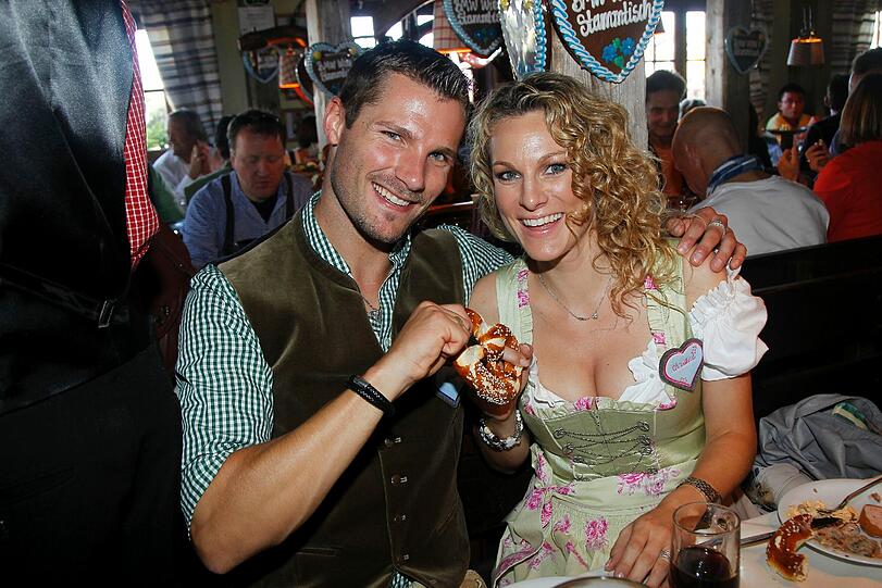 Süßes Paar: DTM.Star Martin Tomzcyk und Christina Surer.
