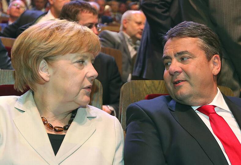 Da passt nicht mehr viel dazwischen: Angela Merkel (CDU) und Sigmar Gabriel (SPD) nähern sich beim Mindestlohn an.