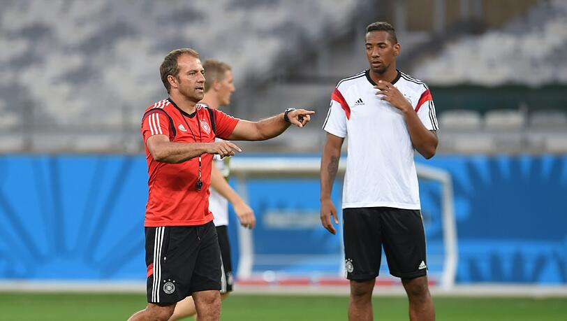 Gemeinsam Weltmeister 2014: Flick und Jérôme Boateng (r.). Gemeinsam Weltmeister 2014: Flick und Jérôme Boateng (r.).