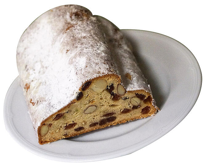 Für Klassiker: DER MÜNCHNER-KINDL-STOLLEN - Er ist ein Klassiker unter den Christstollen &ndash; und die Münchner Antwort auf das berühmte Exemplar aus Dresden. Mit dem feinen Unterschied, dass hier die &bdquo;Königin der Nüsse&ldquo;, die edle Macadamia, verbacken ist. Erfunden hat den Münchner-Kindl-Stollen die Münchner Bäckerinnung. Die Marke ist geschützt &ndash; kopieren verboten!