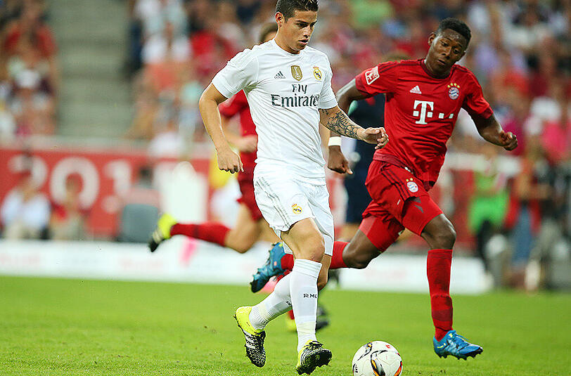 Tragen sie vielleicht bald schon das Trikot des jeweils anderen Vereins? James Rodriguez von Real Madrid (links) und David Alaba vom FC Bayern.