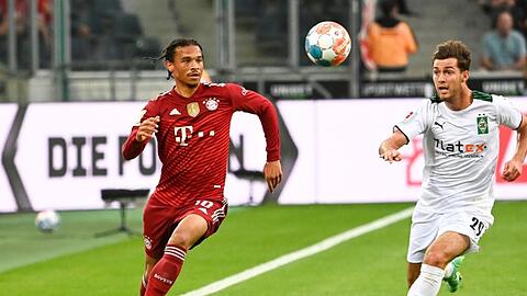 Leroy Sané (l) in Aktion.