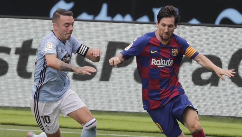 Lionel Messi (r) vom FC Barcelona behauptet den Ballbesitz gegen Celta Vigos Iago Aspas. Lionel Messi (r) vom FC Barcelona behauptet den Ballbesitz gegen Celta Vigos Iago Aspas.