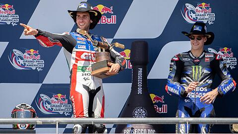 Alex Rins (l) holte sich beim Grand Prix der USA den Sieg.