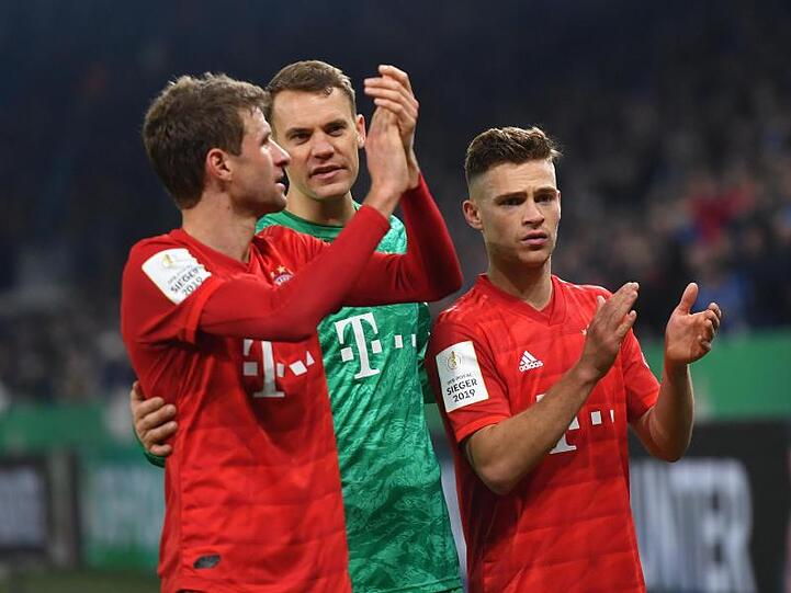 Thomas Müller (l), Kapitän Manuel Neuer (M) und Joshua Kimmich. Foto: Bernd Thissen/dpa/Archivbild