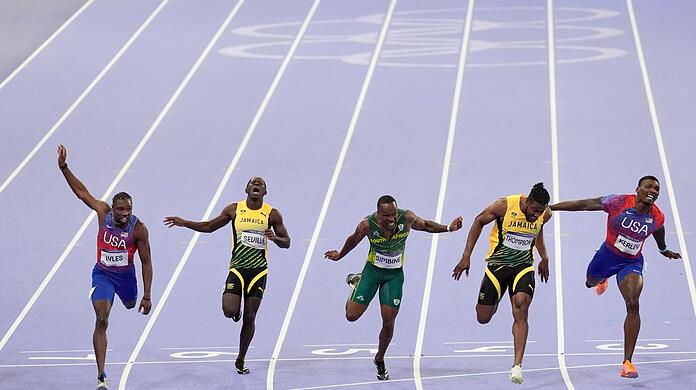 Der knappe Zieleinlauf im 100-Meter-Finale bei Olympia.