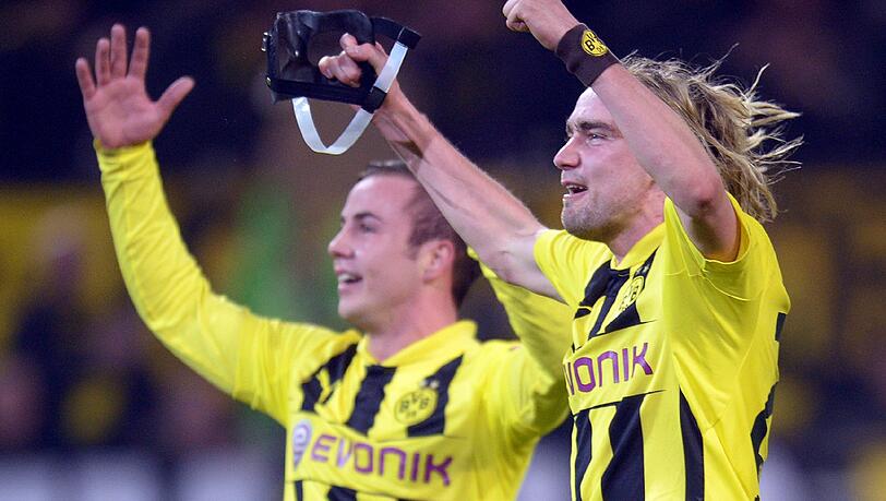 Spielten 2013 noch gemeinsam beim BVB: Mario Götze (l.) und Marcel Schmelzer. Spielten 2013 noch gemeinsam beim BVB: Mario Götze (l.) und Marcel Schmelzer.