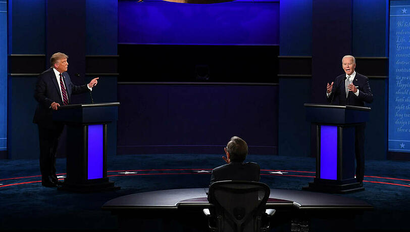 Chaotische TV-Debatte: Donald Trump, Moderator Chris Wallace und Joe Biden Chaotische TV-Debatte: Donald Trump, Moderator Chris Wallace und Joe Biden