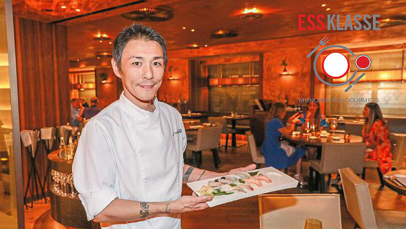 Sushi-Chef Shigeru Fujita mit einer Auswahl der Häppchen, die gerade hinter der Sushi-Bar entstanden sind. Auch im Ess-Klasse-Menü gibt es einen Sushi-Gang.