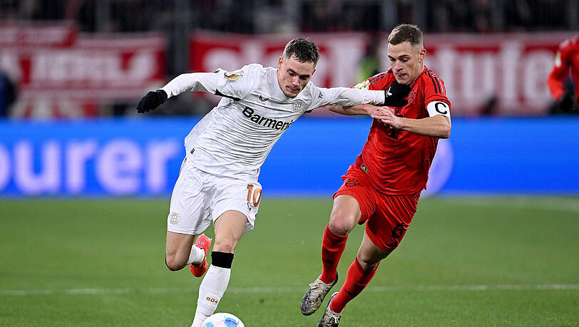 Florian Wirtz (l.) könnte im nächsten Sommer zum FC Bayern wechseln - Joshua Kimmich den Rekordmeister hingegen verlassen.