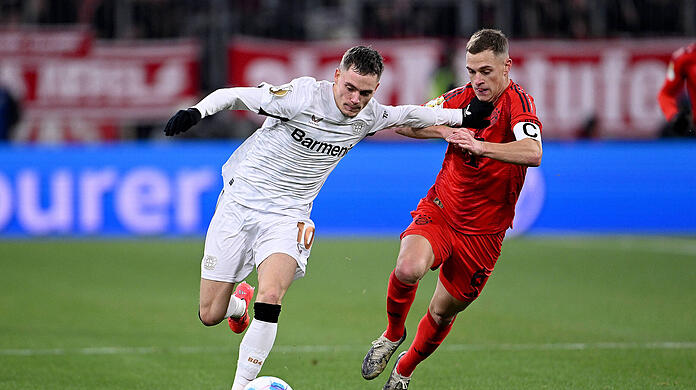 Florian Wirtz (l.) könnte im nächsten Sommer zum FC Bayern wechseln - Joshua Kimmich den Rekordmeister hingegen verlassen.