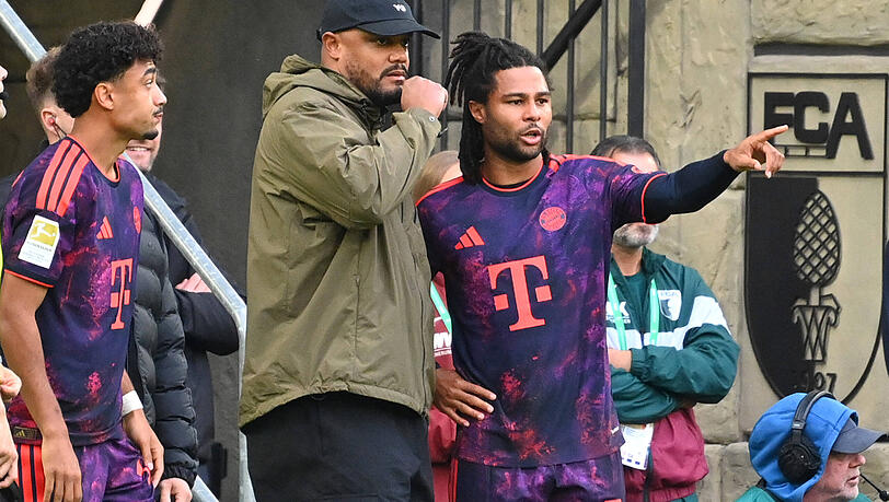 Gutes Verh&auml;ltnis: Trainer Vincent Kompany (l.) und Gnabry.