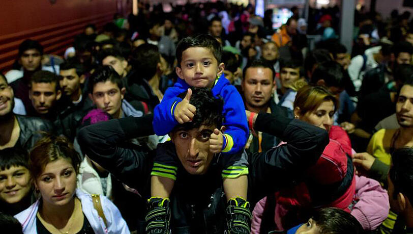 Flüchtlinge im September 2015 auf einem Bahnsteig im Münchner Hauptbahnhof. Flüchtlinge im September 2015 auf einem Bahnsteig im Münchner Hauptbahnhof.