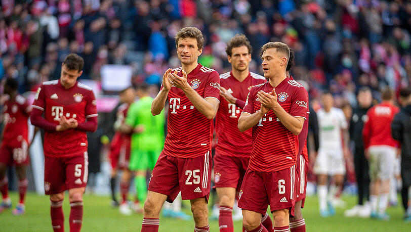Thomas Müller (l.) und Joshua Kimmich erreichten gegen Augsburg einen persönlichen Meilenstein. Thomas Müller (l.) und Joshua Kimmich erreichten gegen Augsburg einen persönlichen Meilenstein.