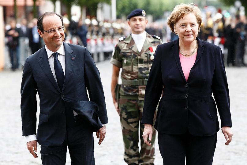 Merkel und Hollande feiern in Reims deutsch-französische Freundschaft. Die Bilder