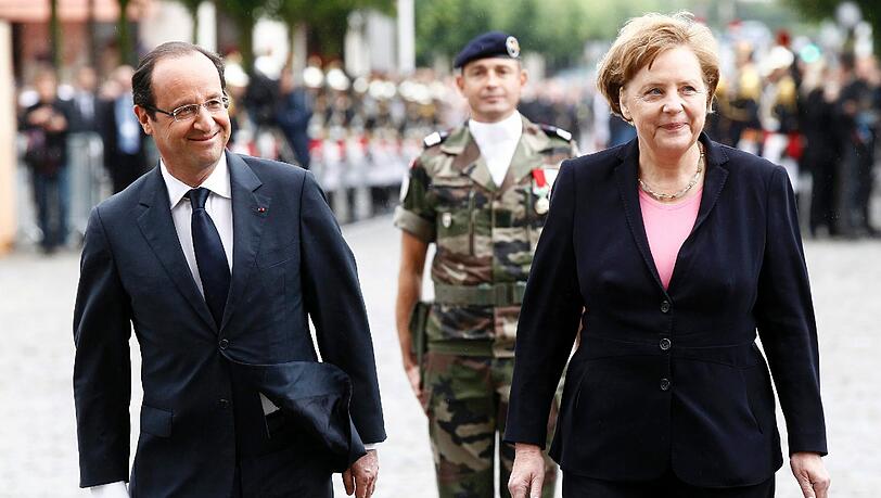 Merkel und Hollande feiern in Reims deutsch-französische Freundschaft. Die Bilder Merkel und Hollande feiern in Reims deutsch-französische Freundschaft. Die Bilder