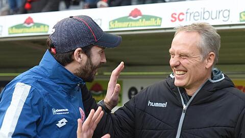 Eröffnen mit ihren Teams den 28. Spieltag: Mainz-Trainer Sandro Schwarz (l) und Freiburgs Christian Streich.