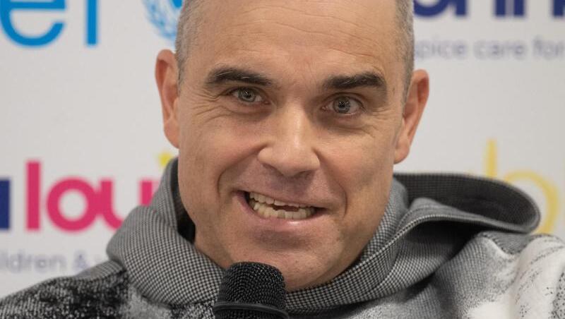 Robbie Williams hält viel von der deutschen Fußball-Nationalmannschaft. Robbie Williams hält viel von der deutschen Fußball-Nationalmannschaft.