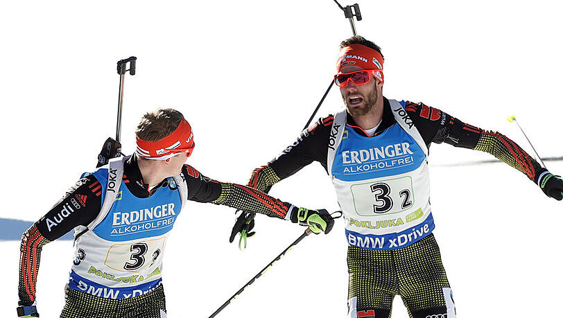 Die deutsche Biathlon-Staffel in der Wechselzone: Matthias Dorfer (r.) übergibt an Benedikt Doll. Die deutsche Biathlon-Staffel in der Wechselzone: Matthias Dorfer (r.) übergibt an Benedikt Doll.