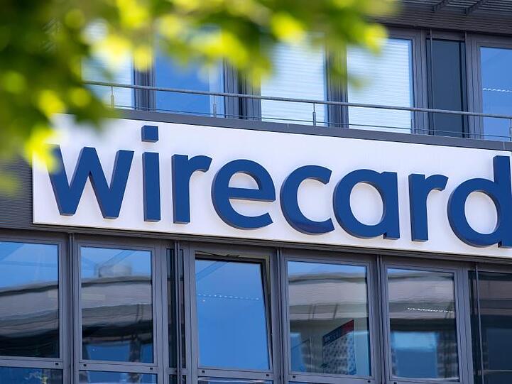 Der Schriftzug von Wirecard ist an der Firmenzentrale des Zahlungsdienstleisters zu sehen. Foto: Sven Hoppe/dpa