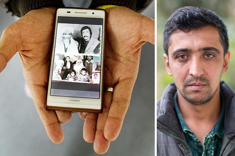 Hamid (43) aus Kabul in Afghanistan zeigt ein Foto von abfotografierten Schwarz-Weiß-Fotos mit Angehörigen, die früher im Wohnzimmer an der Wand hingen.