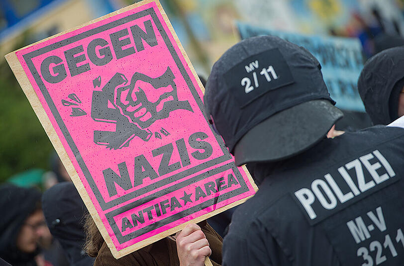 Teilnehmer an einer Kundgebung der NPD am 01. Mai.