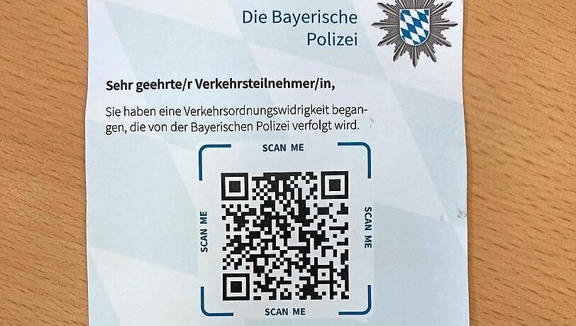 Könnte man fast mit einem Werbezettel verwechseln: die neuen QR-Code-Knöllchen der Münchner Polizei.