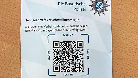 Könnte man fast mit einem Werbezettel verwechseln: die neuen QR-Code-Knöllchen der Münchner Polizei.
