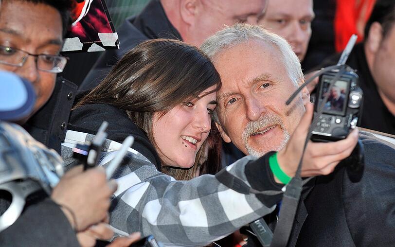 ... zunächst mussten sie aber noch mit Star-Regisseur James Cameron Vorlieb nehmen...