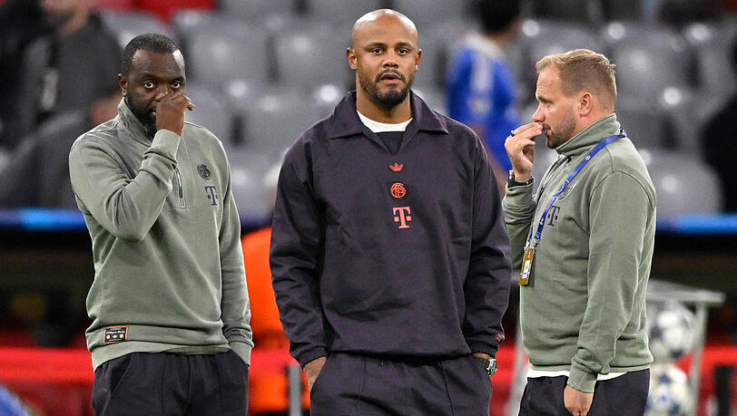 Erfolgsgaranten: Trainer Vincent Kompany (Mitte) mit seinen Assistenten Floribert N'Galula (l.) und Aaron Danks.