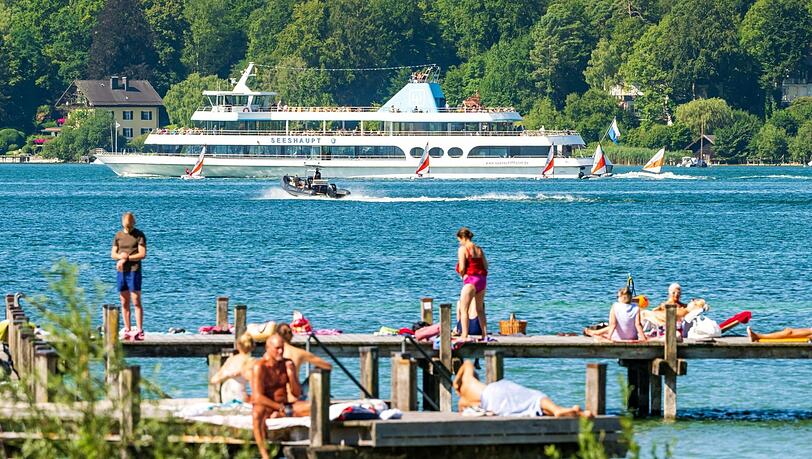 Sonnenhungrige, Schwimmer, Segelboote, Schiffe: An Sommertagen wird es sehr voll am Starnberger See. Das führt zu Problemen.