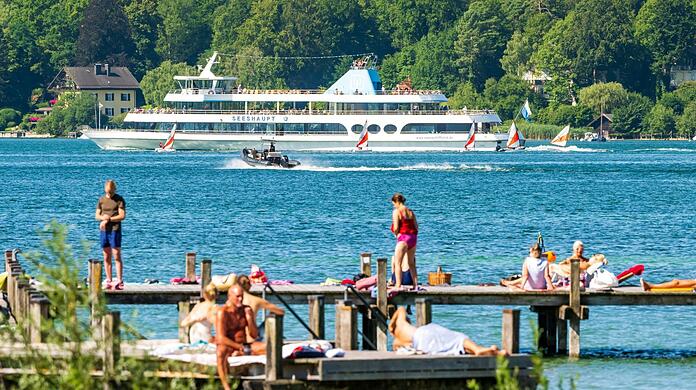 Sonnenhungrige, Schwimmer, Segelboote, Schiffe: An Sommertagen wird es sehr voll am Starnberger See. Das führt zu Problemen.