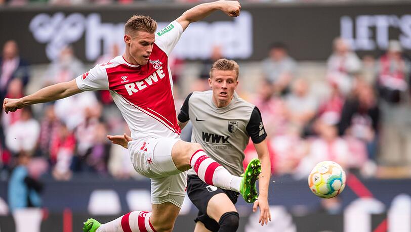Die Kölner um Torschütze Steffen Tigges (l) setzten sich gegen den FC Augsburg durch. Die Kölner um Torschütze Steffen Tigges (l) setzten sich gegen den FC Augsburg durch.