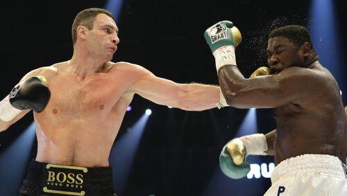 Der neue König der Schwergewichts: Vitali Klitschko, der WBC-Champion Samuel peter übelst vermöbelte. Der neue König der Schwergewichts: Vitali Klitschko, der WBC-Champion Samuel peter übelst vermöbelte.